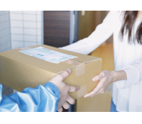 A person handing over a parcel to another person.