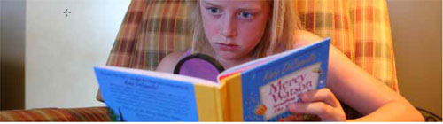 Child reading a book