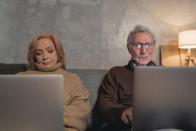 Woman and man at computers