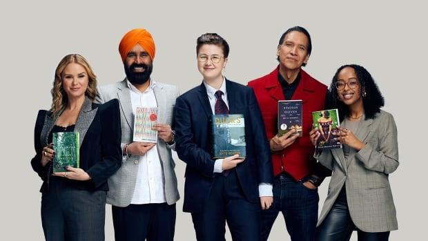 The 5 people defending the Canada Reads shortlist stand together, each holding their chosen book.